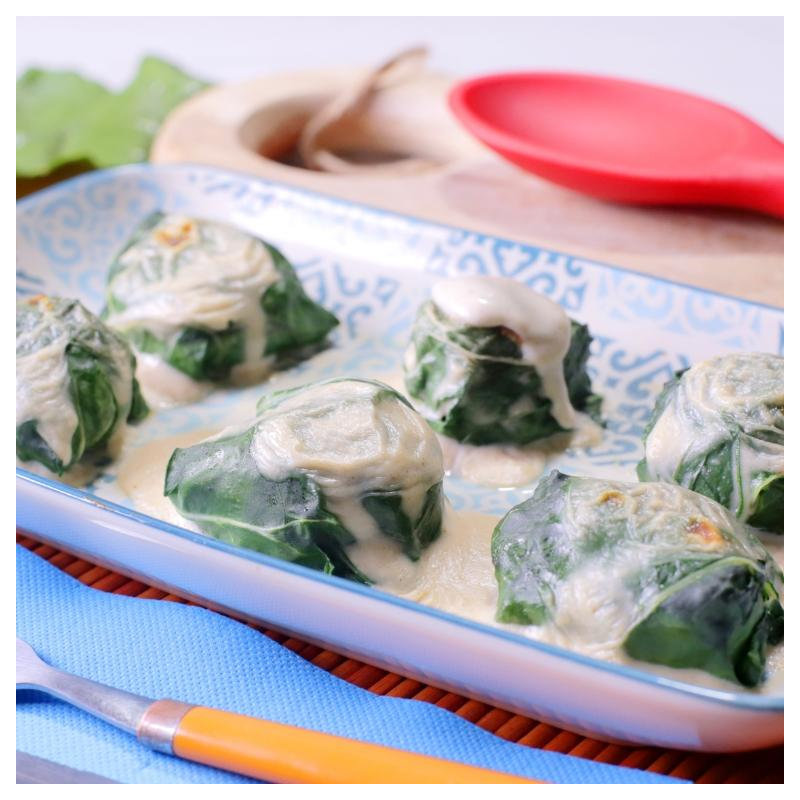 Mangoldröllchen mit Reis in Käsesoße